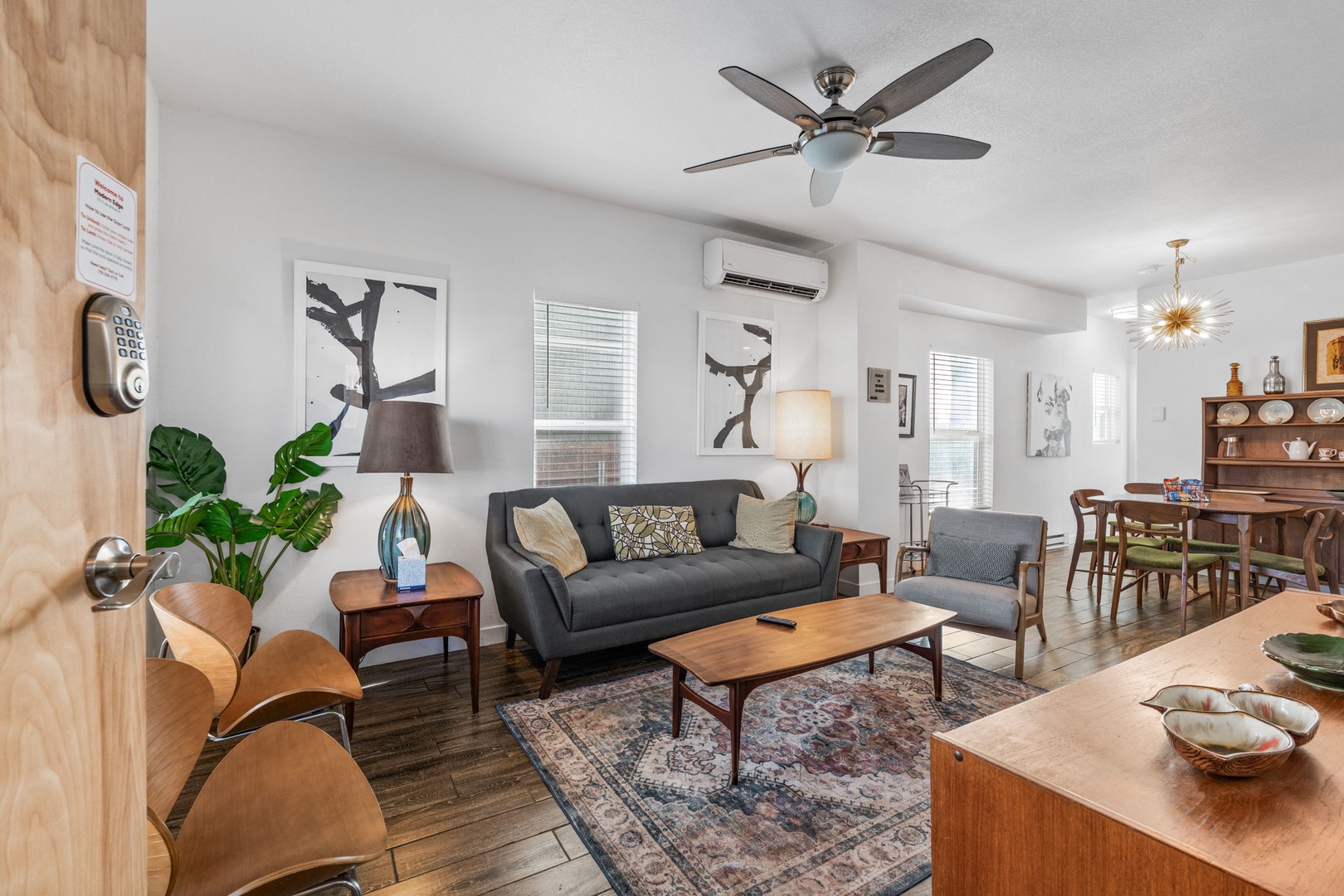 Relax in this stylish open-plan space with modern furnishings, natural light, and thoughtful touches that make you feel right at home.