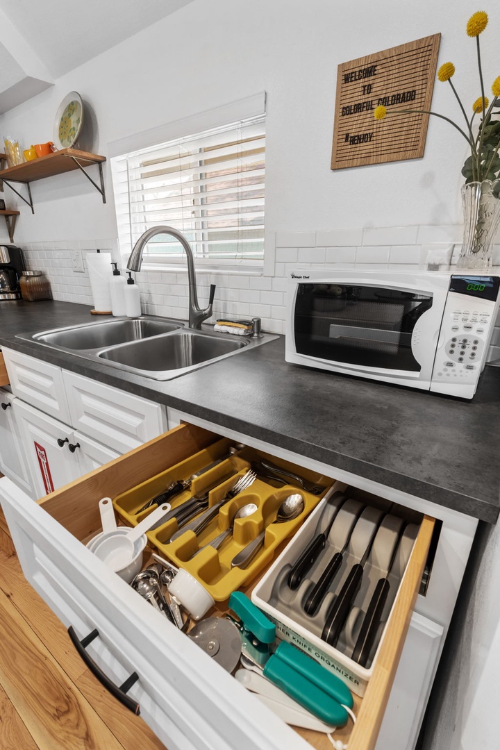 Your fully equipped kitchen features thoughtful organization with everything you need for home-cooked meals during your stay.