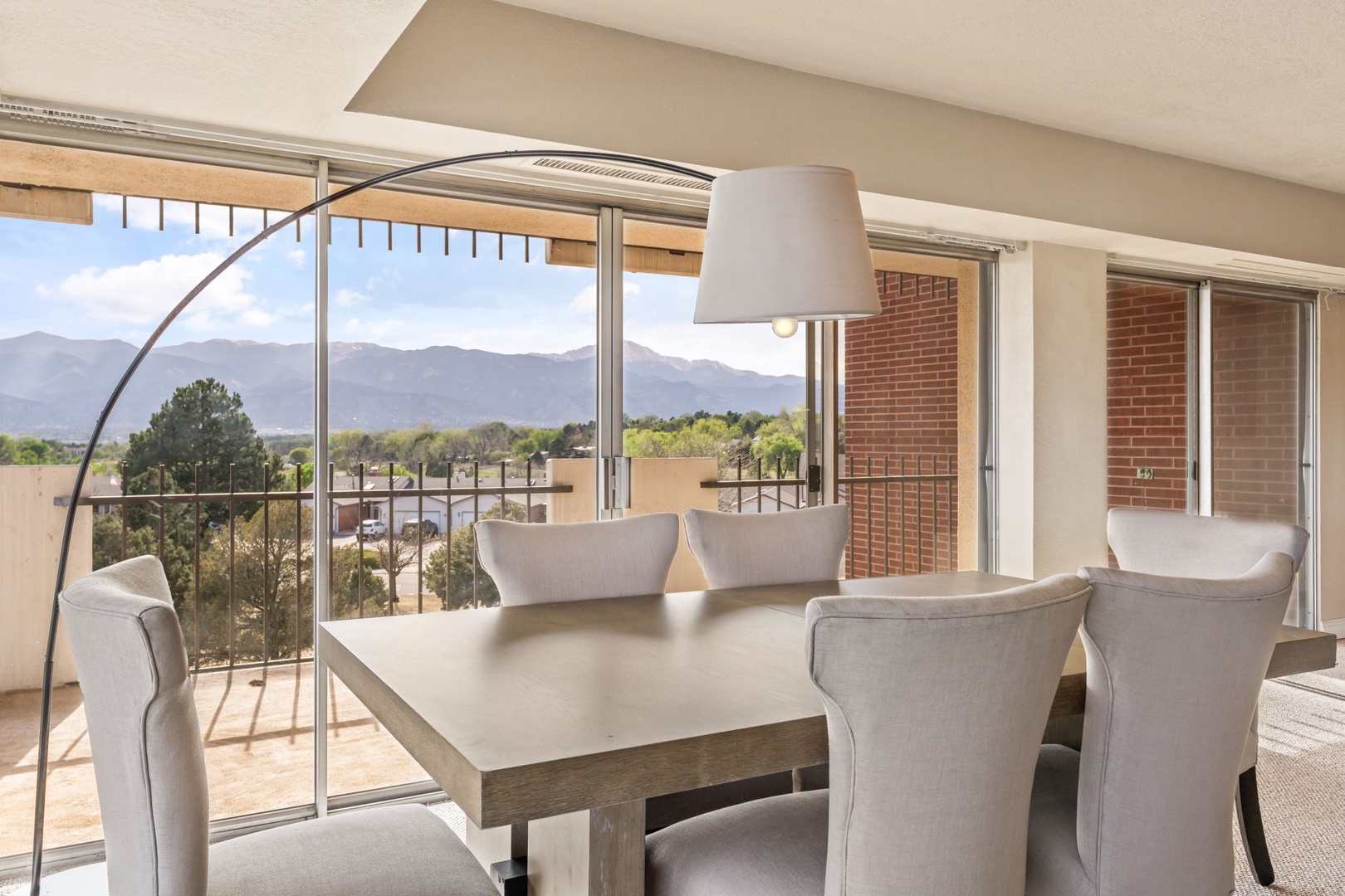 Gather around the table where natural light floods in and stunning mountain views frame every meal you'll share here.