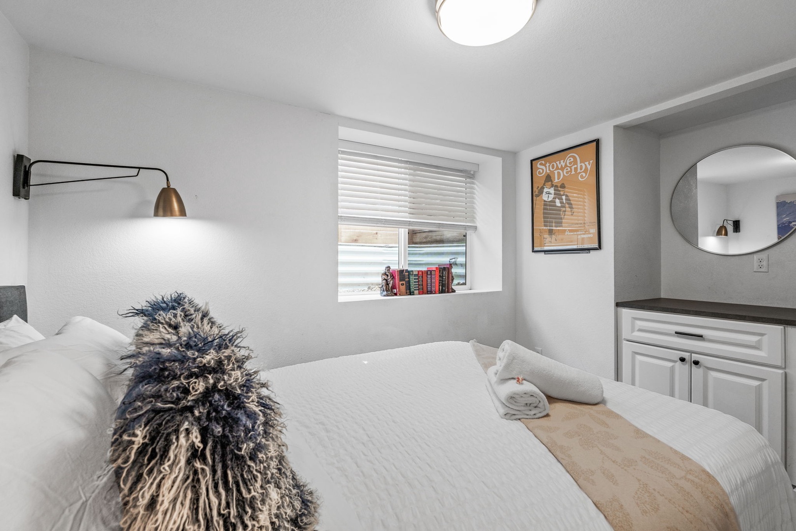 Your cozy bedroom features crisp linens, warm lighting, and thoughtful touches that create the perfect retreat after your adventures.