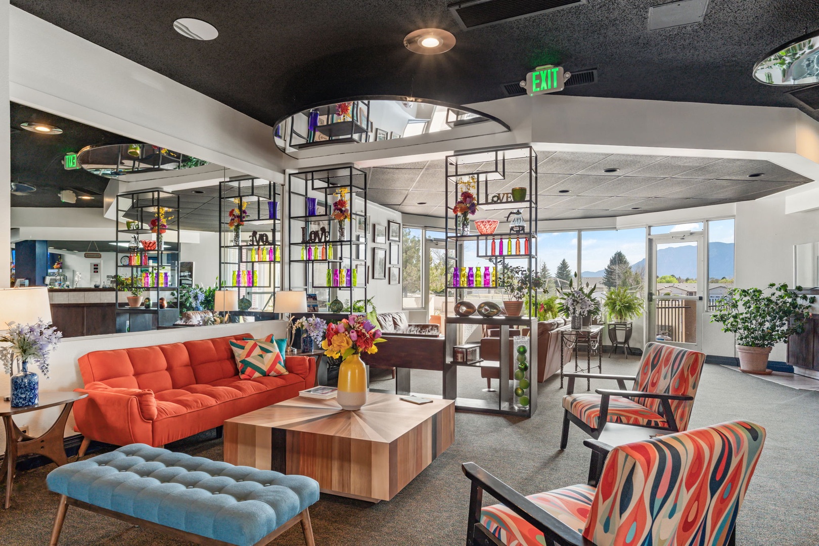 You'll love the stylish, modern lobby with vibrant seating and colorful design details, creating a welcoming space where you can relax and feel right at home.