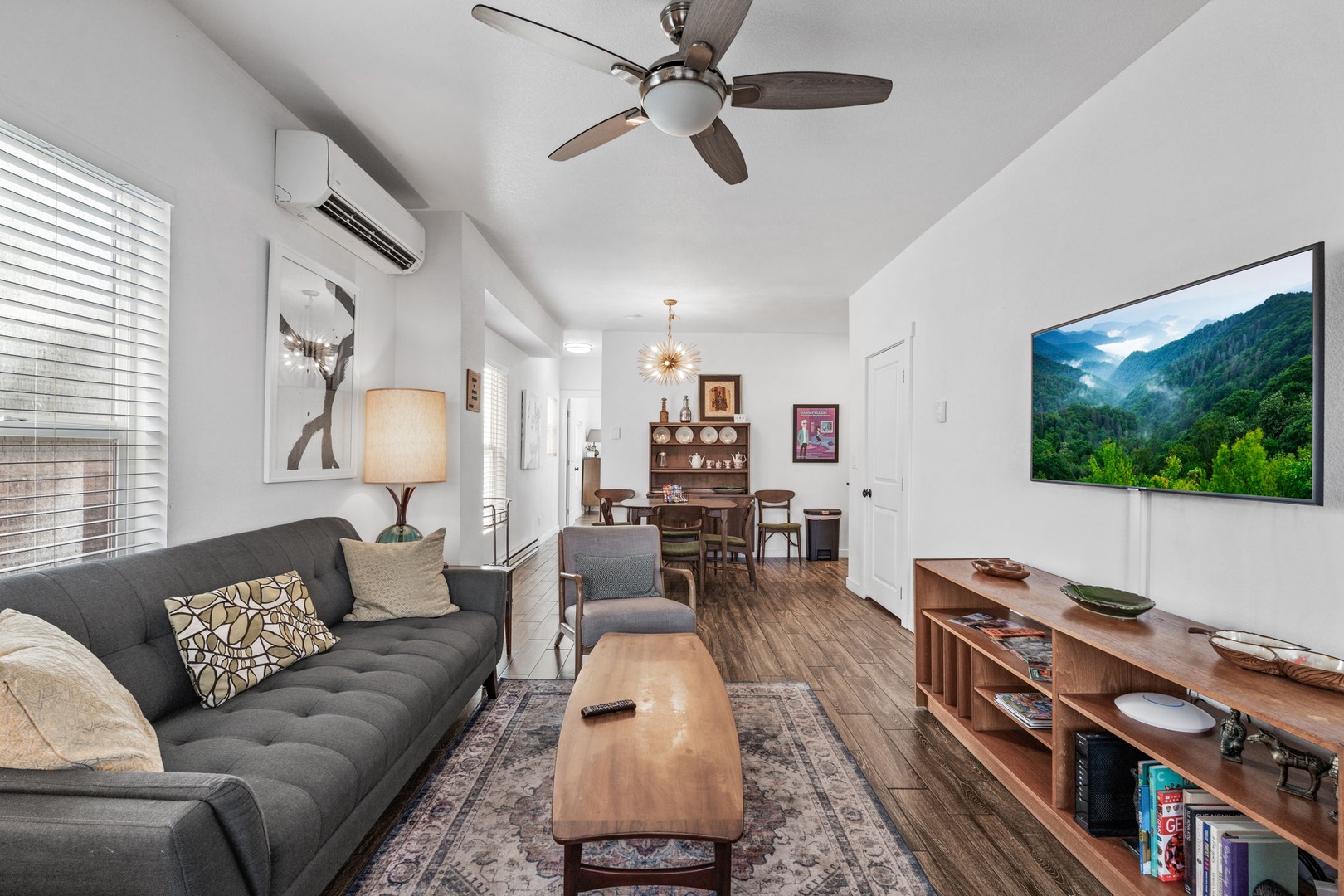 Relax in your bright, modern living space with comfortable seating, large TV, and climate-controlled comfort for perfect downtime.