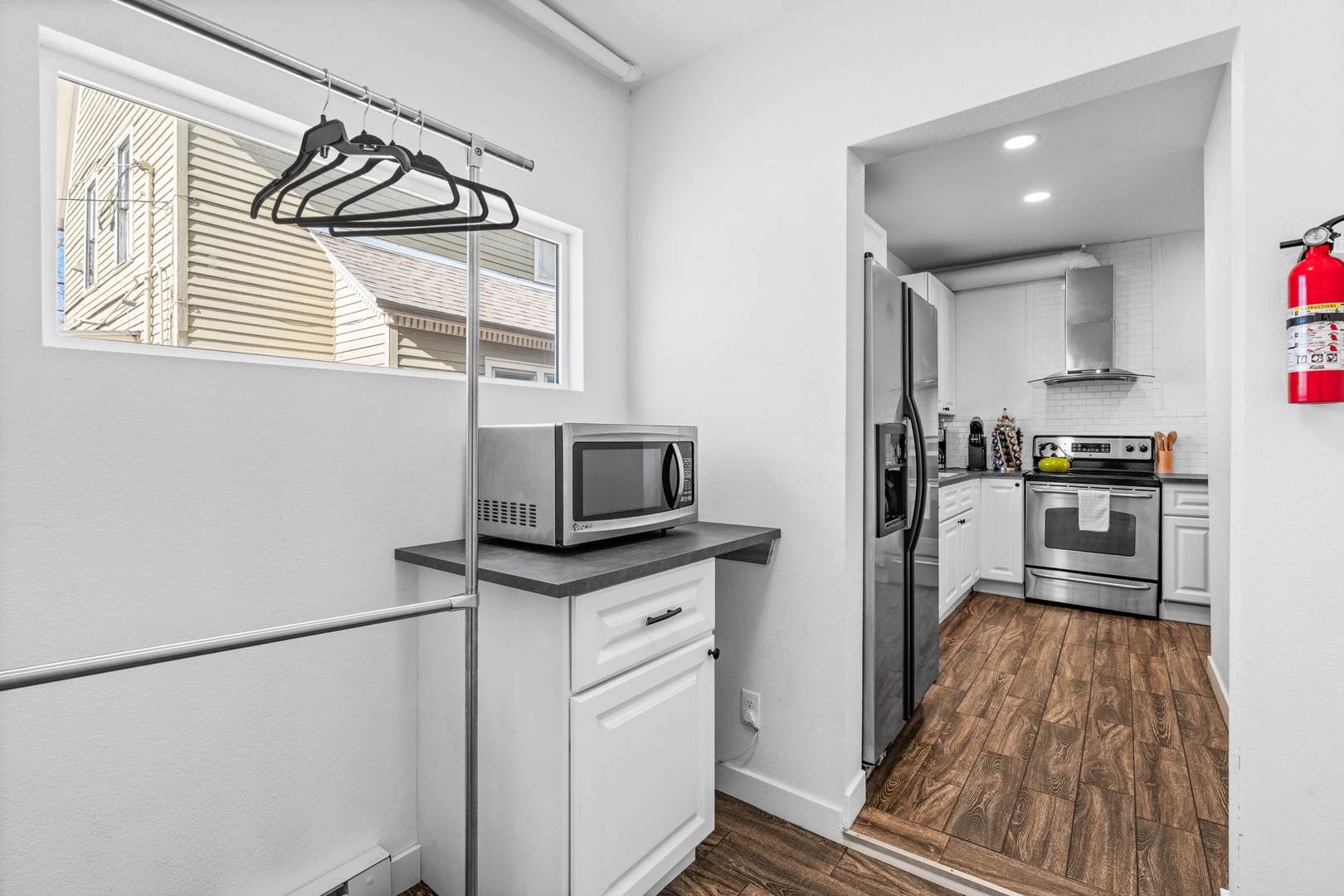 Step into your fully equipped kitchen where modern appliances and ample storage make meal prep a breeze during your stay.
