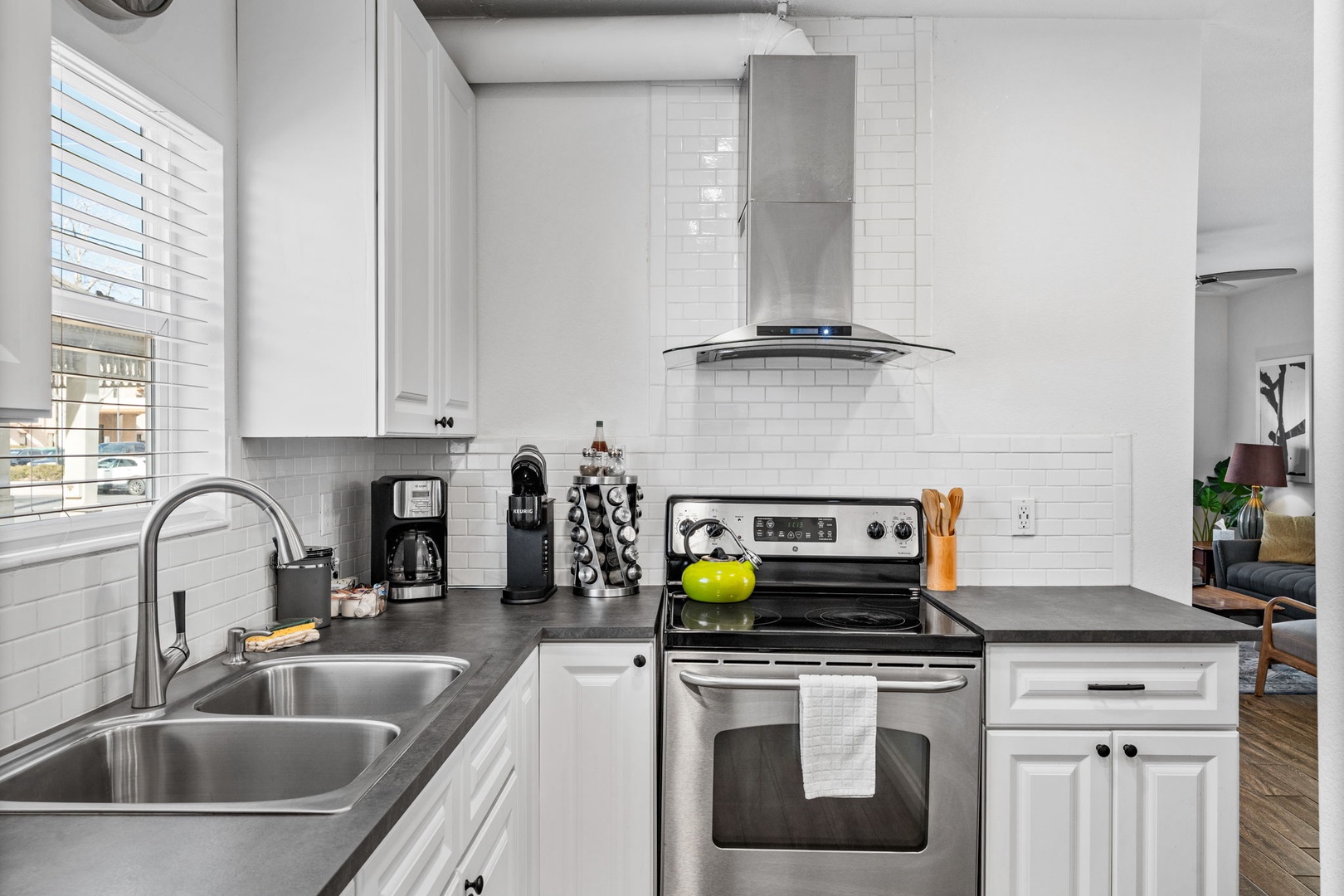 Your fully equipped kitchen features modern appliances and sleek countertops for preparing memorable meals during your stay.