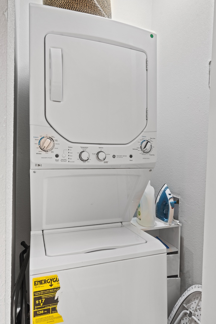 Your in-unit laundry facilities include a stacked washer and dryer, plus an iron for keeping your clothes fresh during your stay.