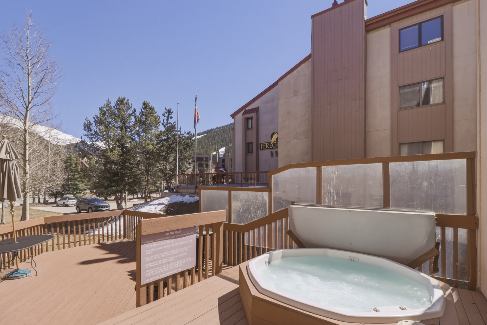 Soak in the bubbling hot tub while soaking up mountain views from your private deck—pure relaxation awaits.