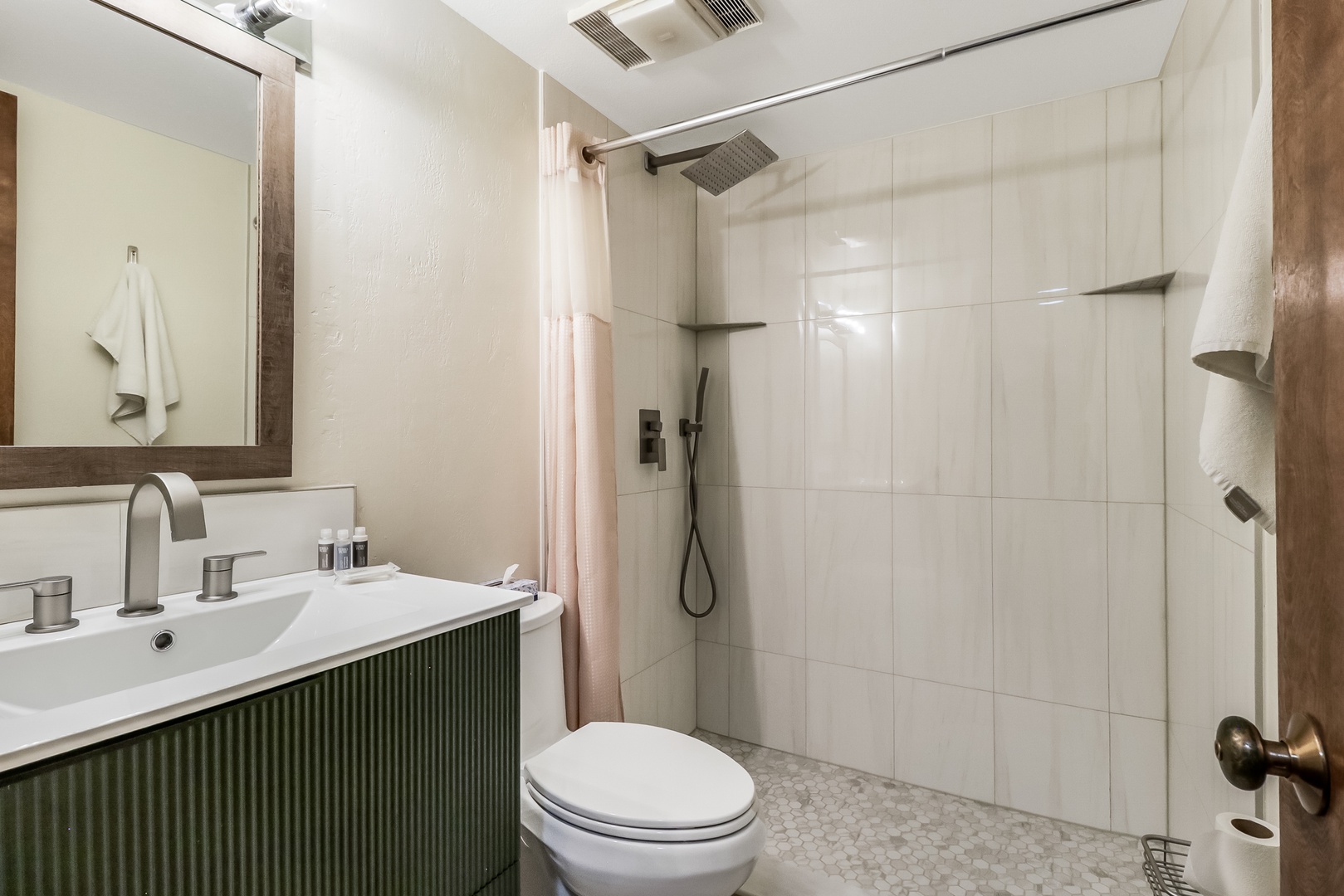 Step into your stylish bathroom with modern fixtures, a refreshing shower, and thoughtful touches that make your morning routine a pleasure.