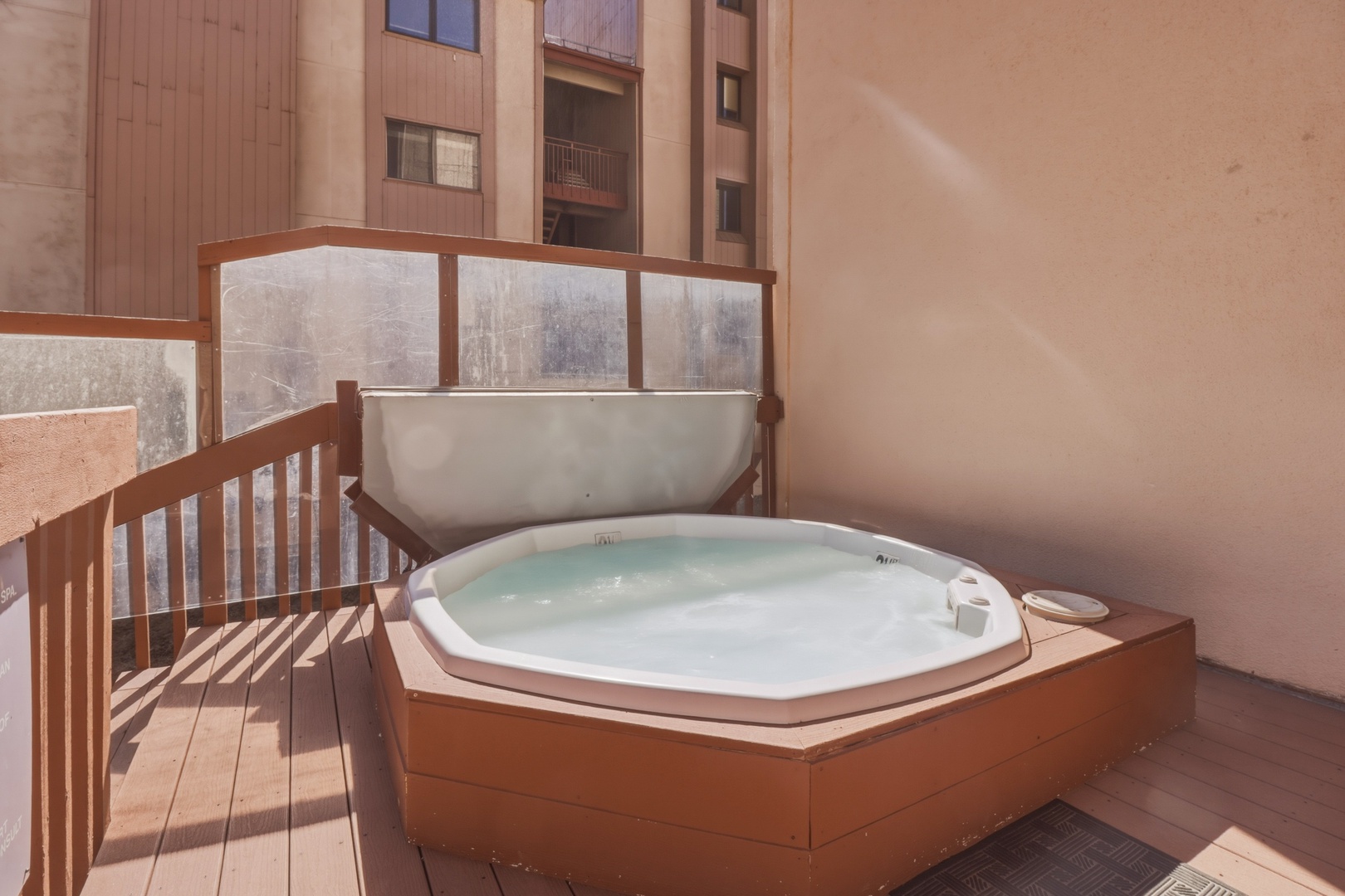 Soak in your private hot tub on the sunny terrace, where warm bubbles meet cool mountain air.