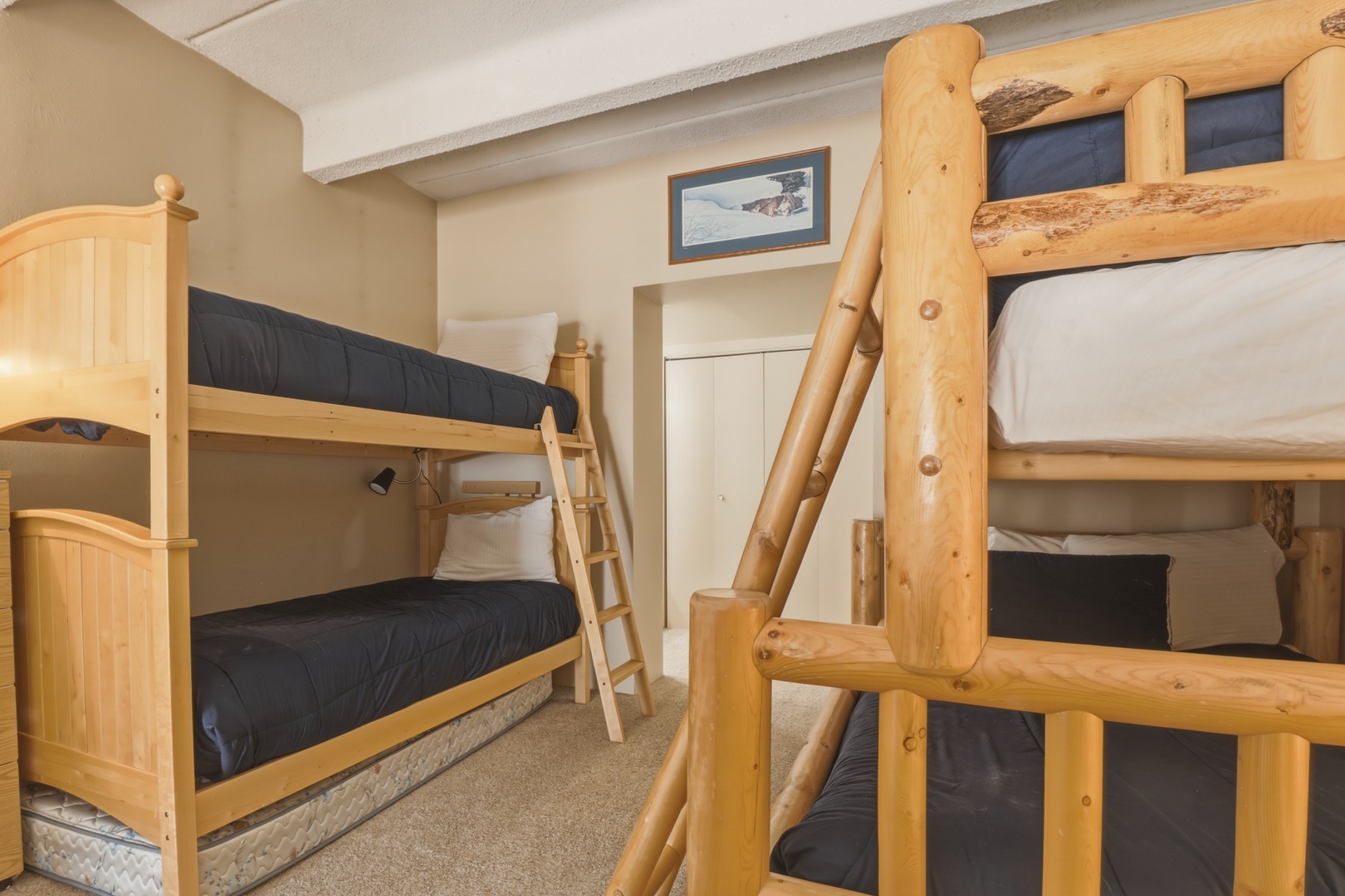 Cozy bunk room with sturdy wooden beds where you'll drift off to mountain dreams after adventure-filled days.