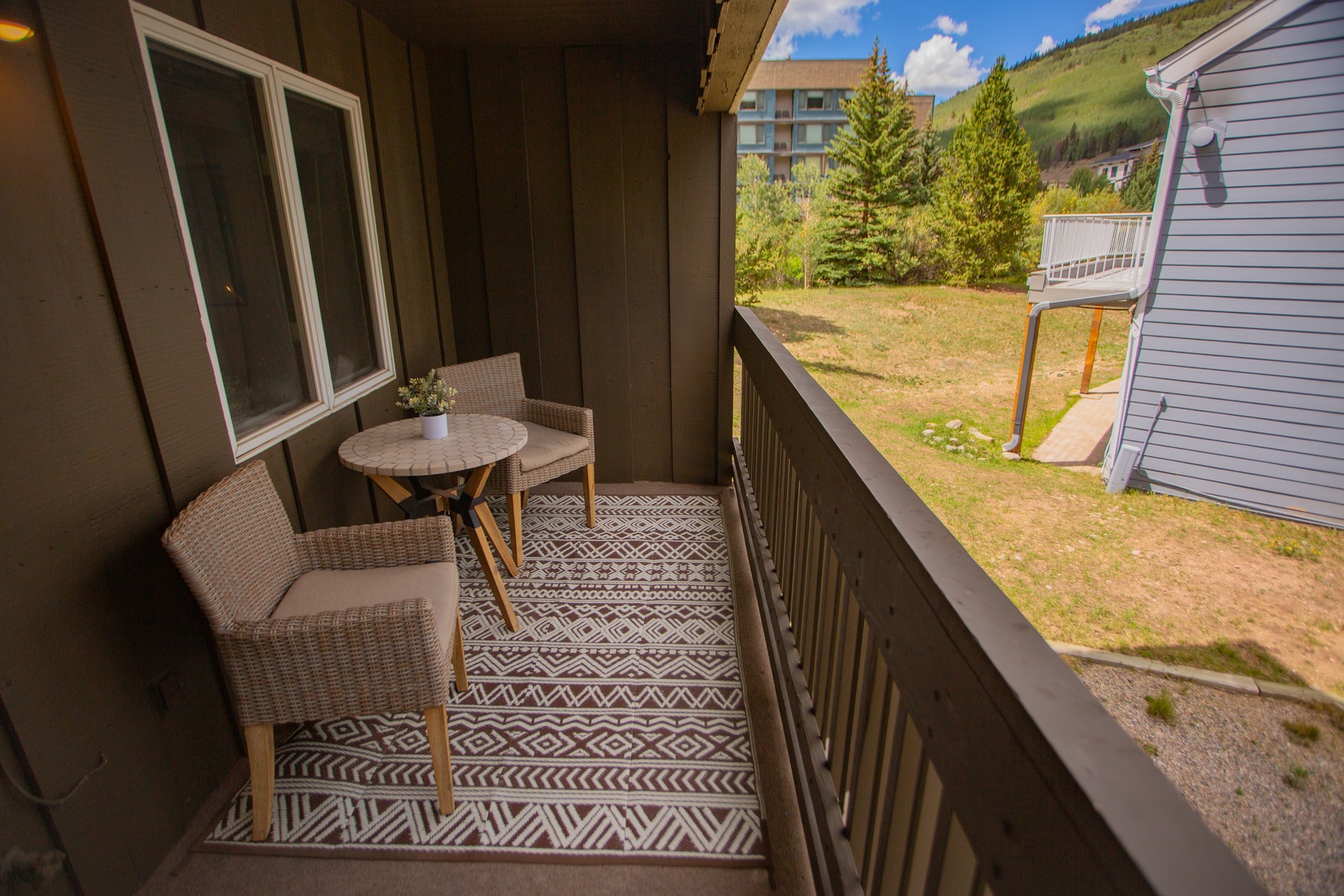 Step out onto your private balcony with morning coffee and soak in the fresh mountain air. Comfortable seating and stunning alpine views make this your perfect spot to unwind after a day exploring.