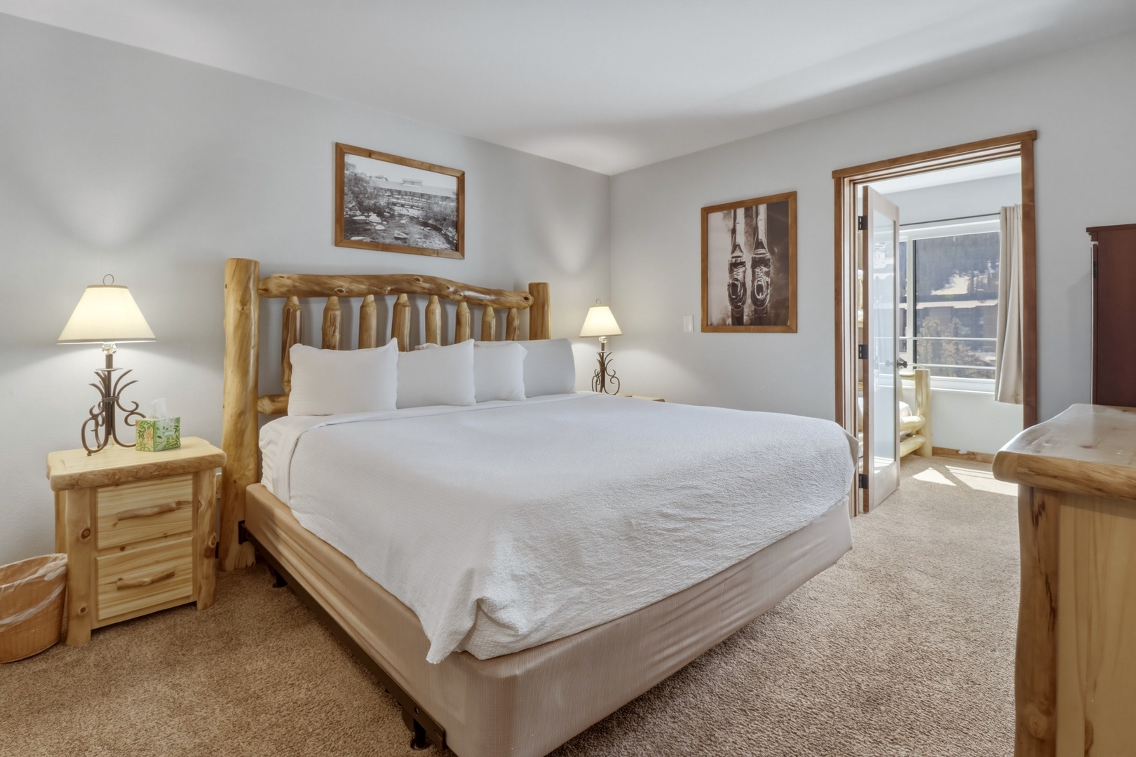 Sink into your cozy rustic retreat with handcrafted log furniture and crisp linens that promise restful mountain evenings.