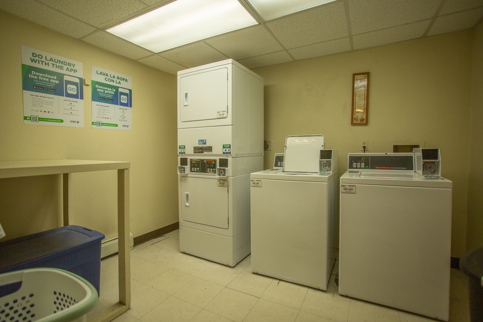 Convenient on-site laundry room equipped with modern washers and dryers makes it easy to keep your clothes fresh during your stay, with helpful app-based access.