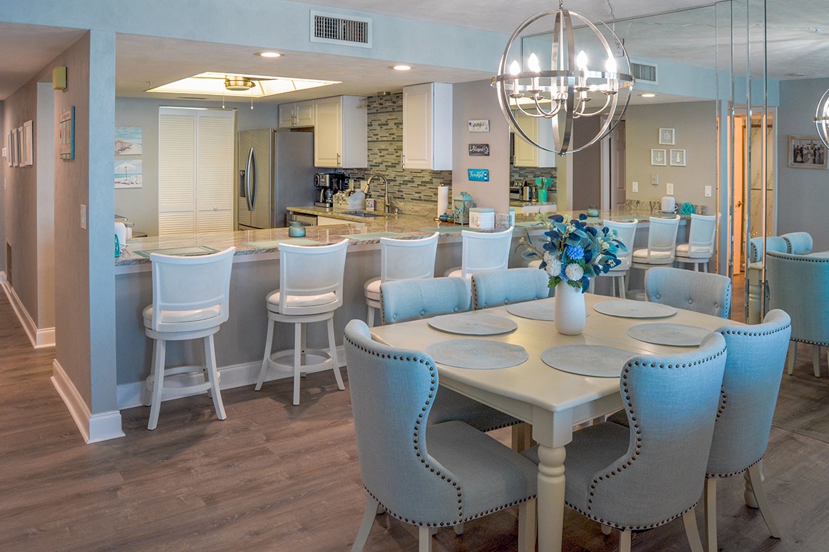 Gather around your elegant dining table or pull up a seat at the kitchen island for memorable meals together.