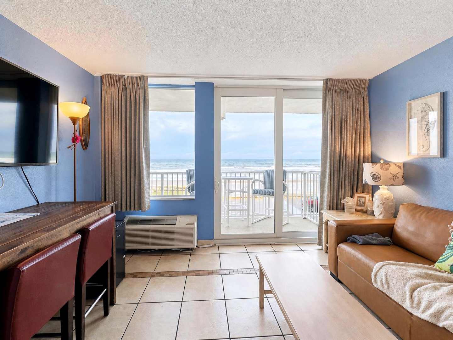Settle into your coastal retreat with sweeping ocean views right from your living room. Step through the glass doors to your private balcony and breathe in the sea air—pure relaxation awaits.