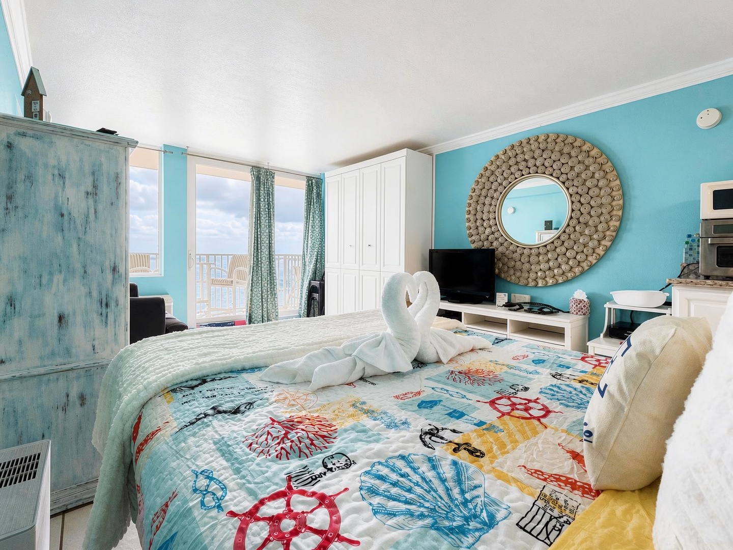 Drift off in this coastal retreat where sea-inspired colors and beach-themed touches create your personal paradise. Wake up to ocean views from your private balcony.