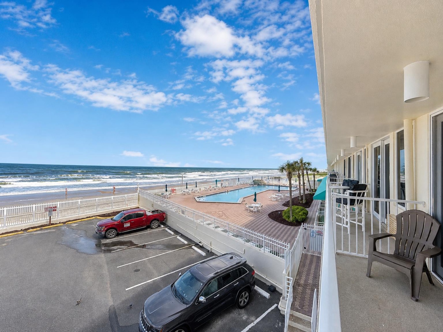Step onto your private balcony and breathe in the salty ocean breeze. Watch the waves roll in, spot palm trees swaying below, and enjoy your front-row seat to sun-soaked beach days and endless blue horizons.