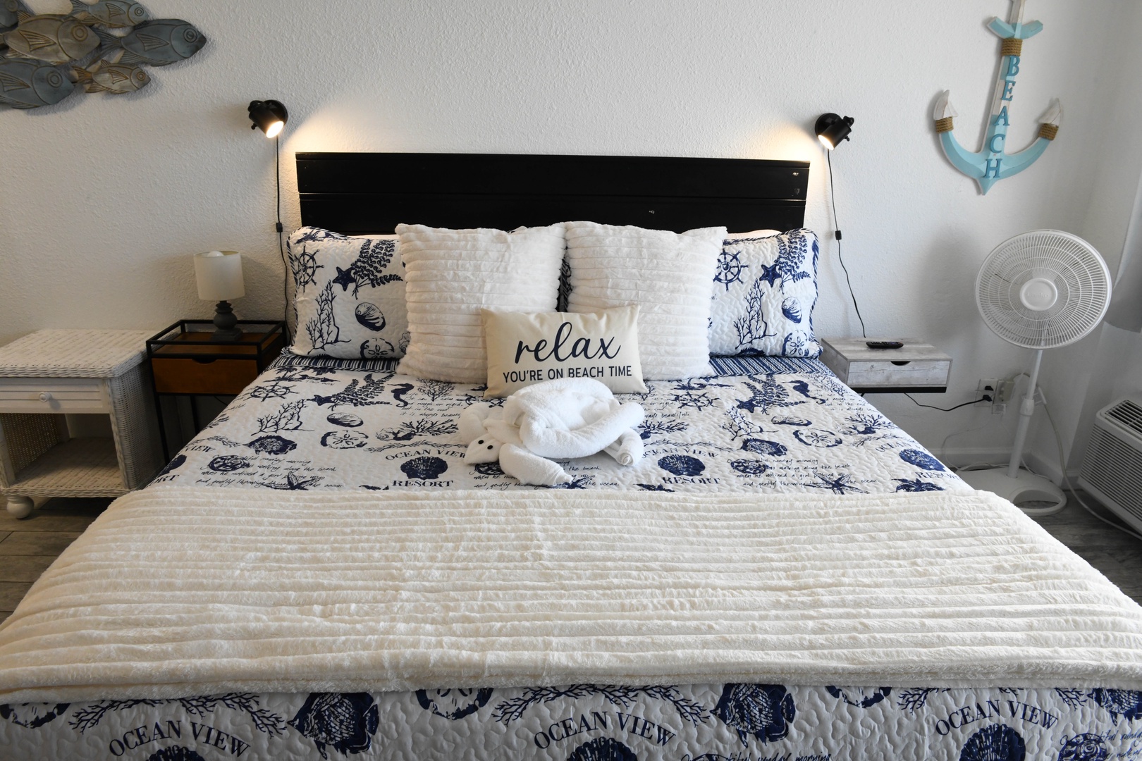Sink into your coastal-themed bedroom, where nautical touches and crisp linens invite you to truly relax—you're on beach time now.