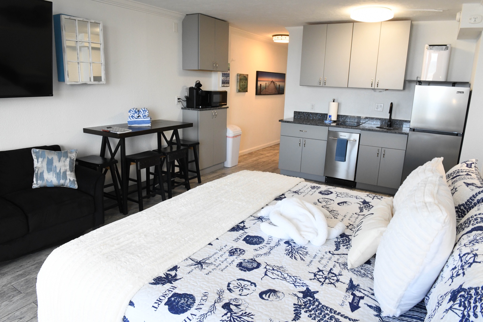Your studio blends cozy sleeping quarters with a full kitchen and dining space, perfect for unwinding after a day of exploring. Fresh linens, modern appliances, and thoughtful touches await.