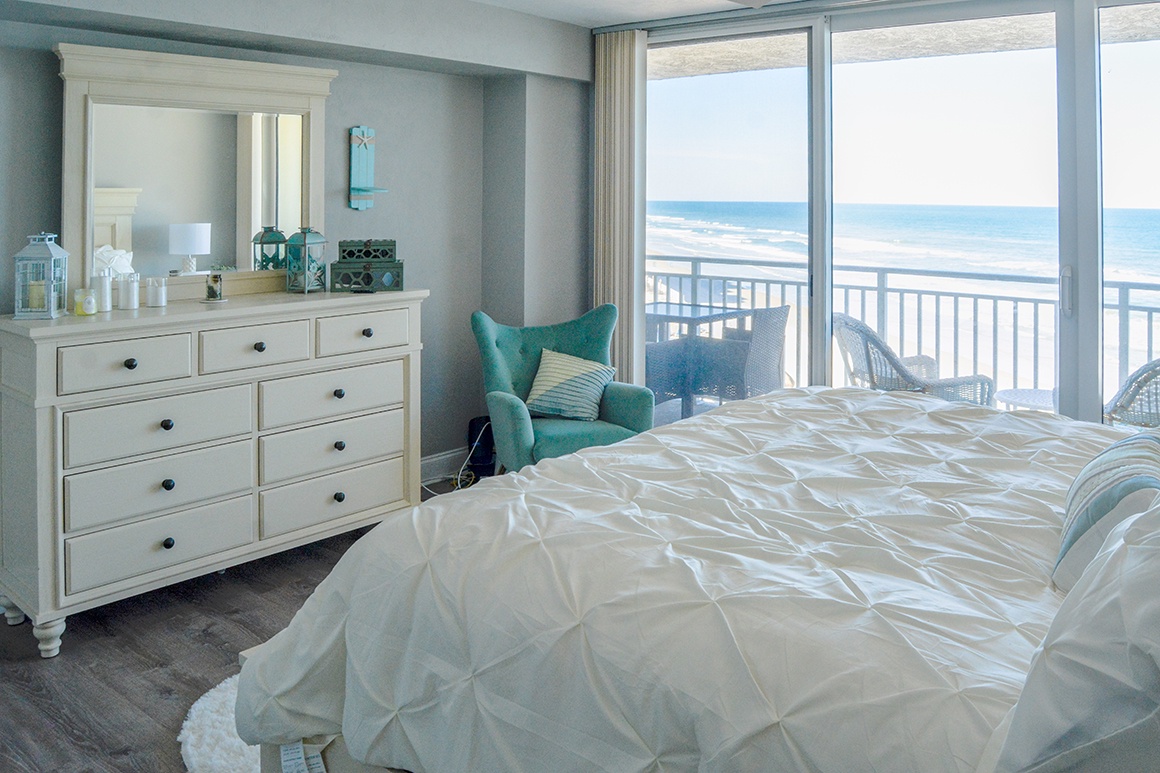 Wake up to endless ocean views from your cozy bedroom, where soft linens and gentle sea breezes create the perfect retreat.