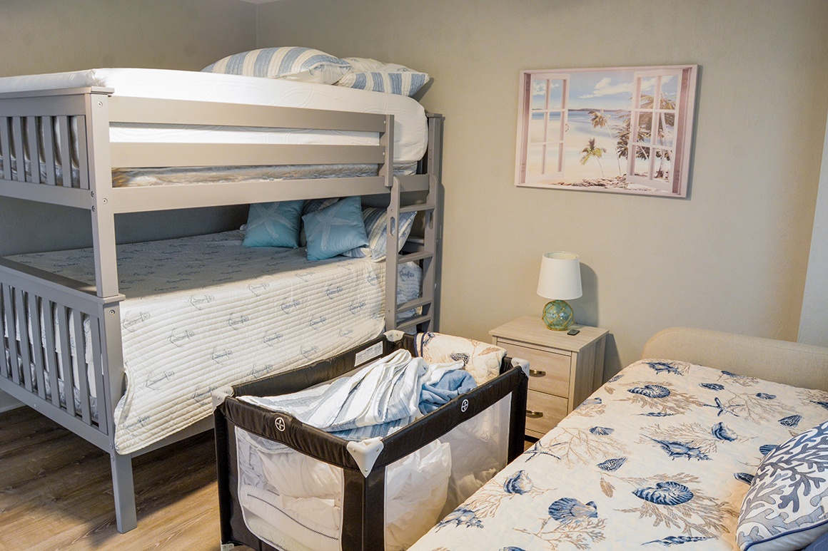 Your family room features comfortable bunk beds and a cozy single bed, perfect for kids or extra guests to sleep soundly.