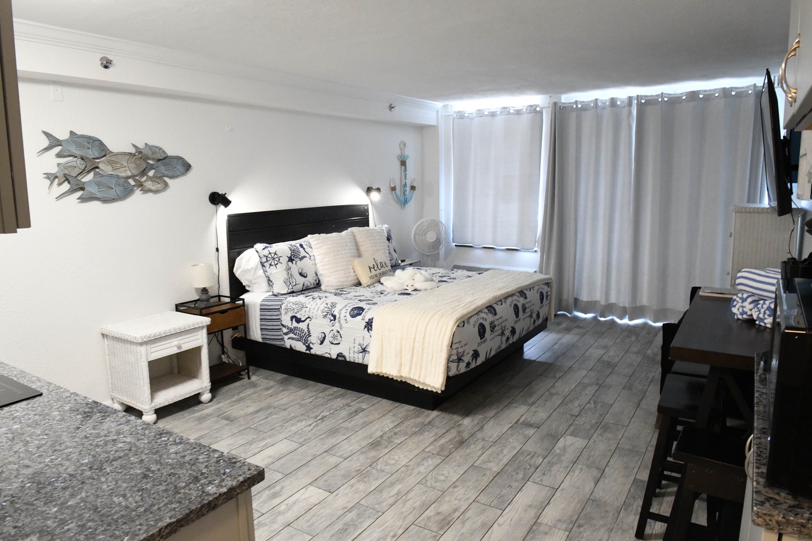 Unwind in your airy coastal retreat, where nautical charm meets modern comfort. Drift off beneath crisp linens and gentle ocean-inspired décor after a day by the shore.