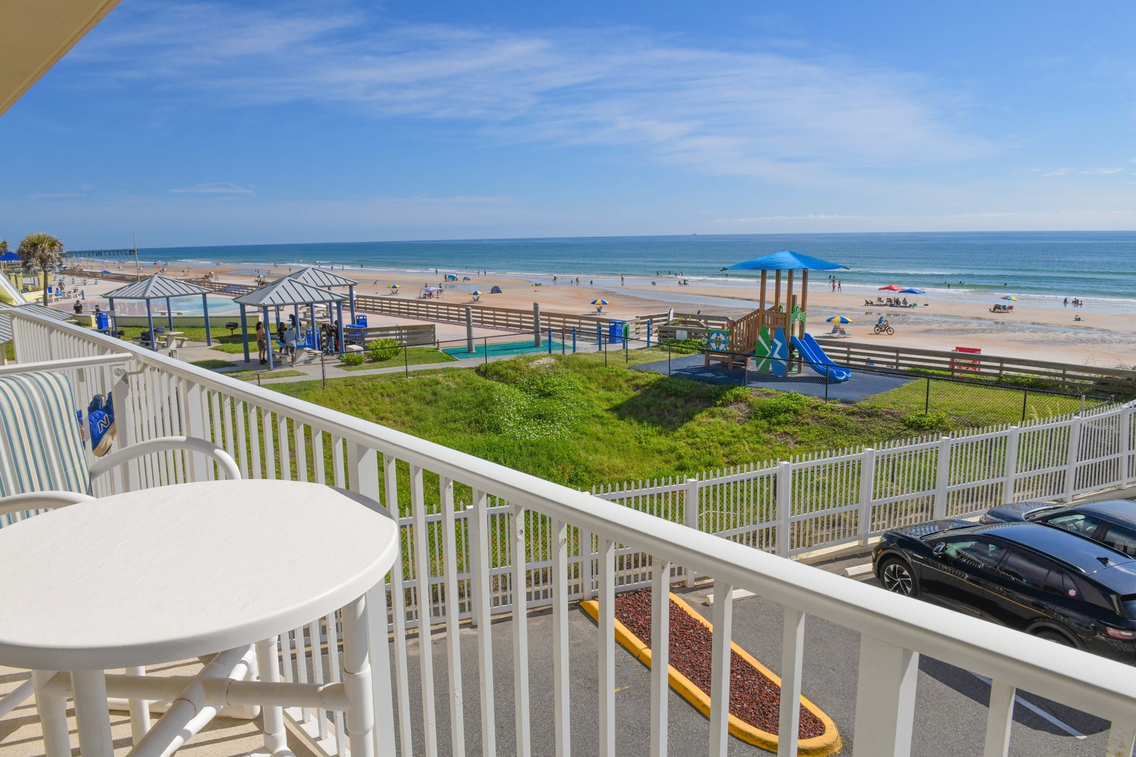 Sip your morning coffee on your private balcony as you gaze at the beach playground and sparkling ocean just steps from your door.