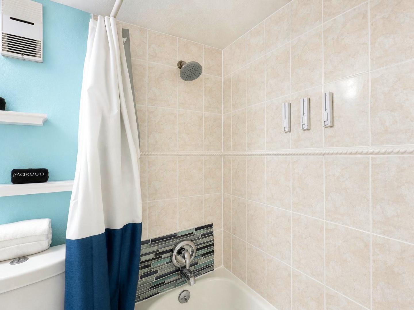 Refresh after a day of exploring in your private bathroom, complete with tiled shower, fluffy towels, and personal toiletries at the ready.