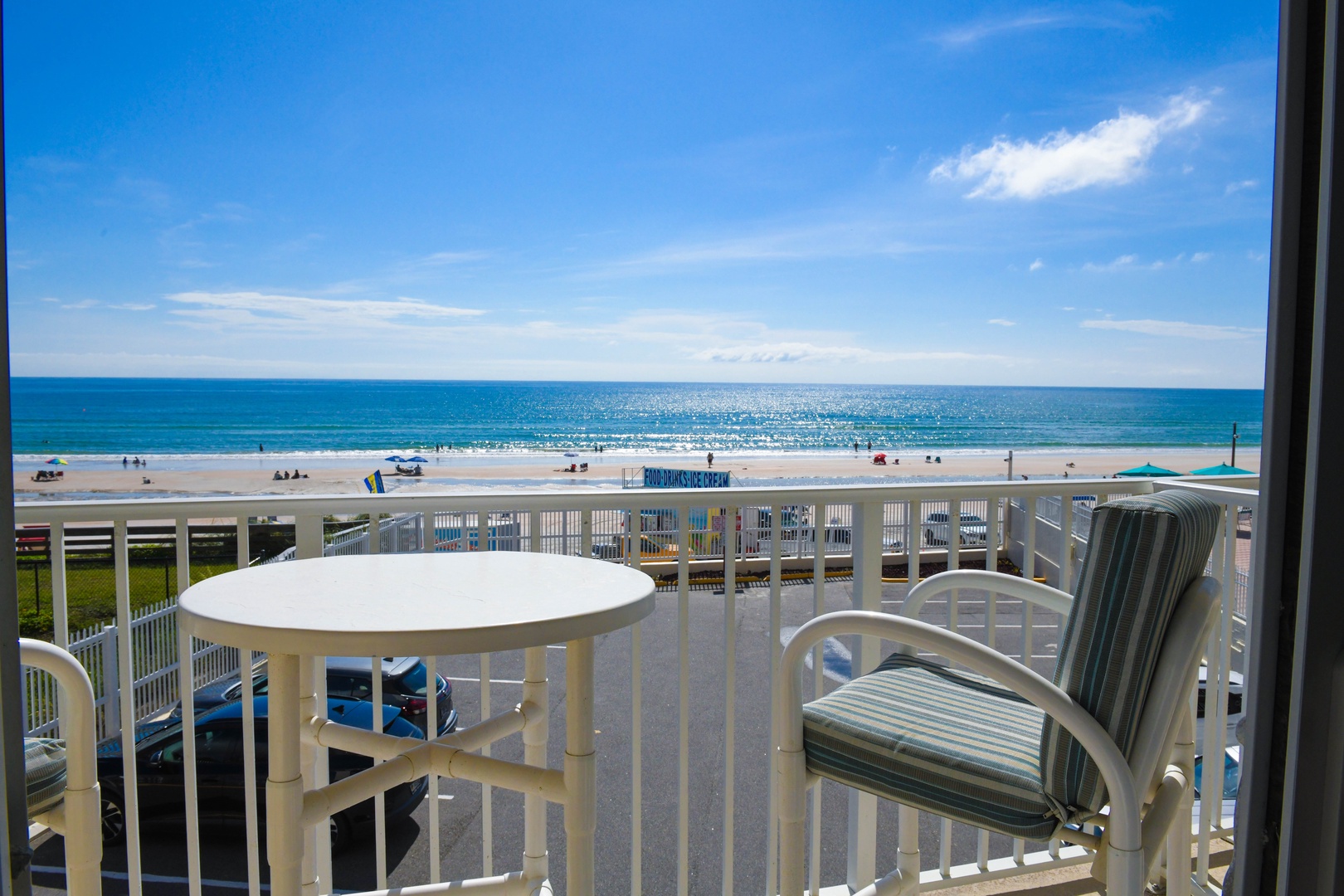 Step out onto your private balcony to take in breathtaking ocean views. Enjoy morning coffee or evening sunsets at your bistro table as waves roll gently onto the sandy shore below.