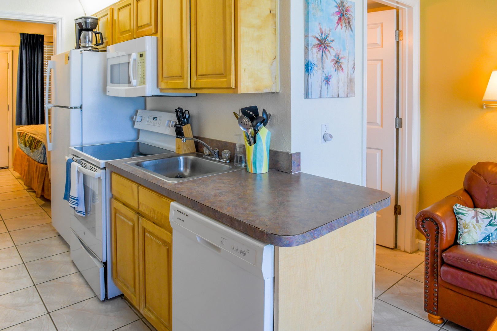 Your fully equipped kitchen has everything you need to whip up meals, with modern appliances, ample counter space, and a bright, welcoming layout that makes cooking a breeze.