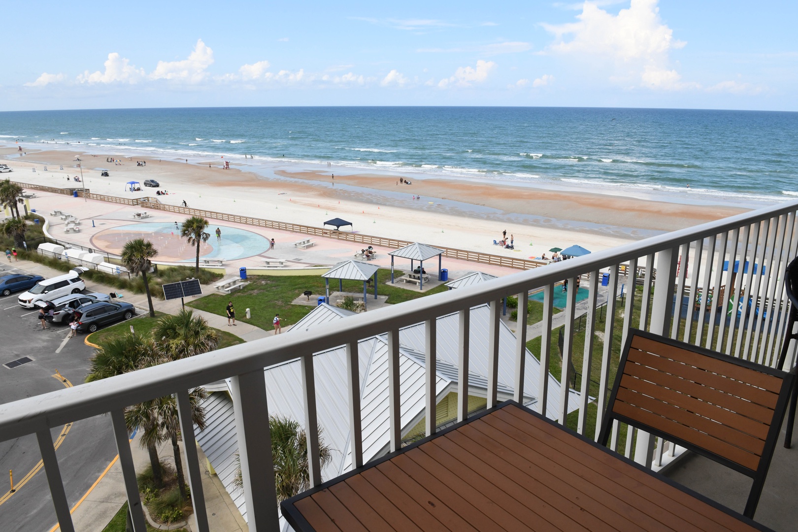 Step out onto your private balcony and soak in breathtaking views of golden sand, rolling waves, and the endless horizon—your perfect retreat awaits just beyond the railing.