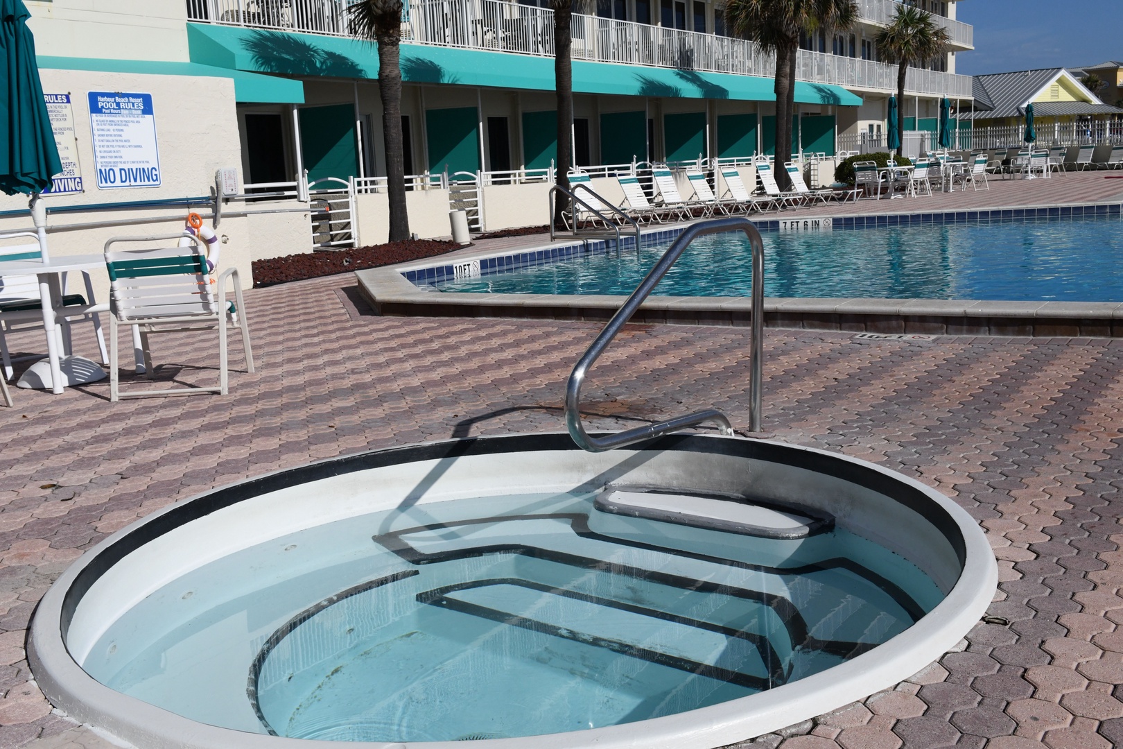 Ease into vacation mode in the spa before enjoying a swim in the pool, surrounded by swaying palms and plenty of sunny loungers—your perfect poolside retreat awaits.