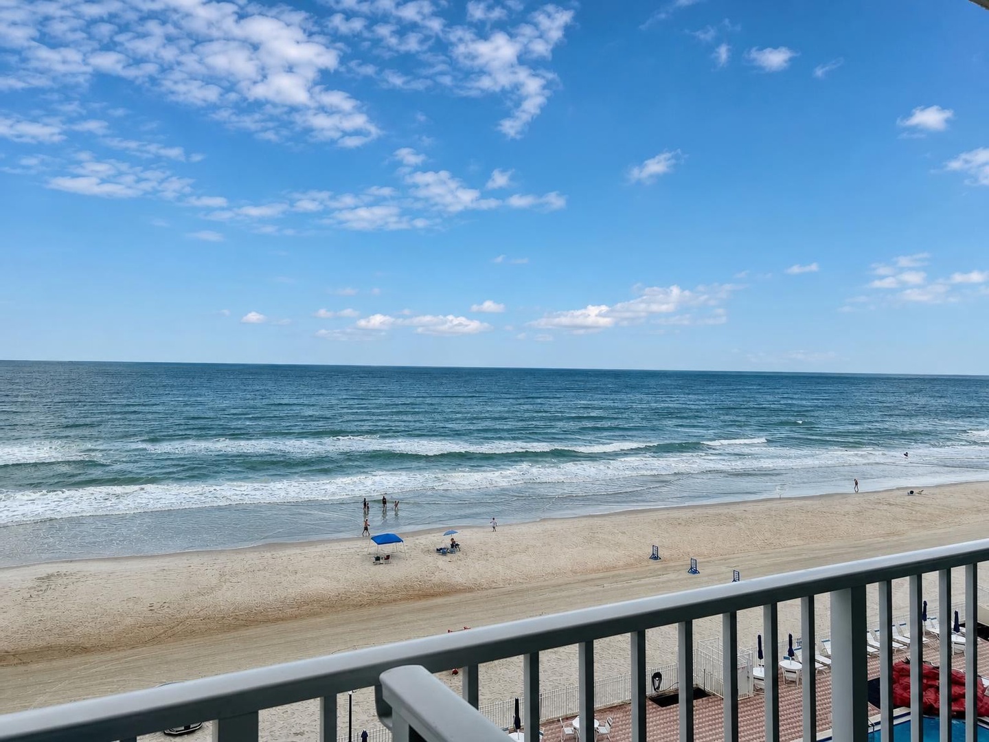 Picture yourself on your private balcony, watching waves roll in across endless ocean views and soft sandy shores—your perfect beach escape awaits.