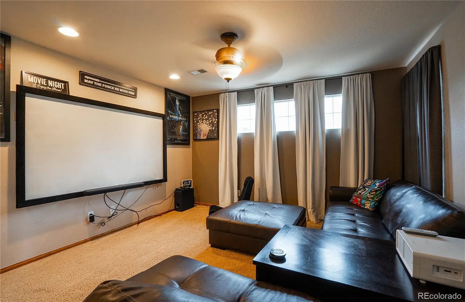 Sink into plush leather seating for your own private movie theater experience, complete with surround sound and projection screen.