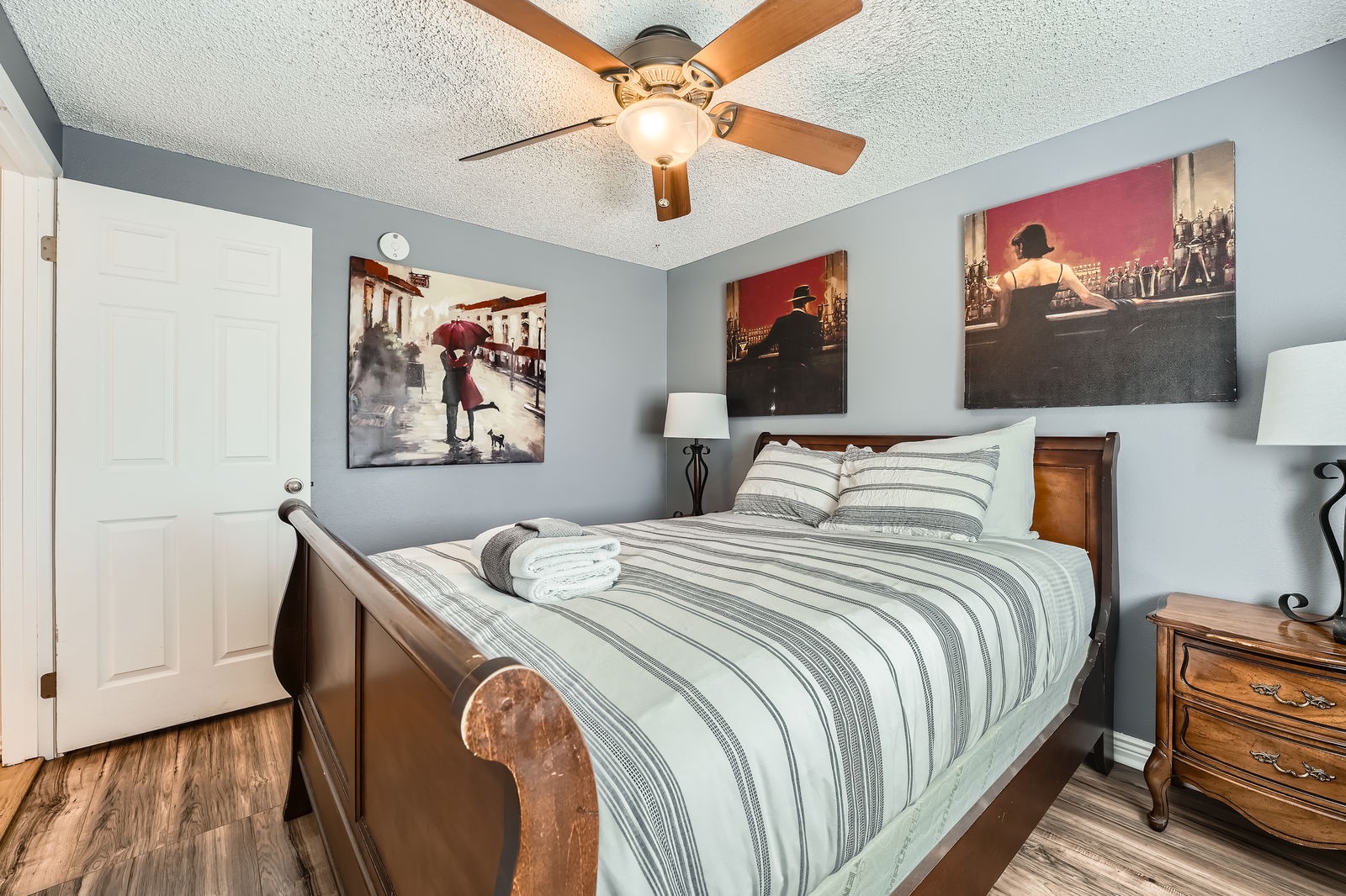Rest peacefully in your elegantly appointed bedroom with stylish artwork and soft linens waiting to welcome you home.