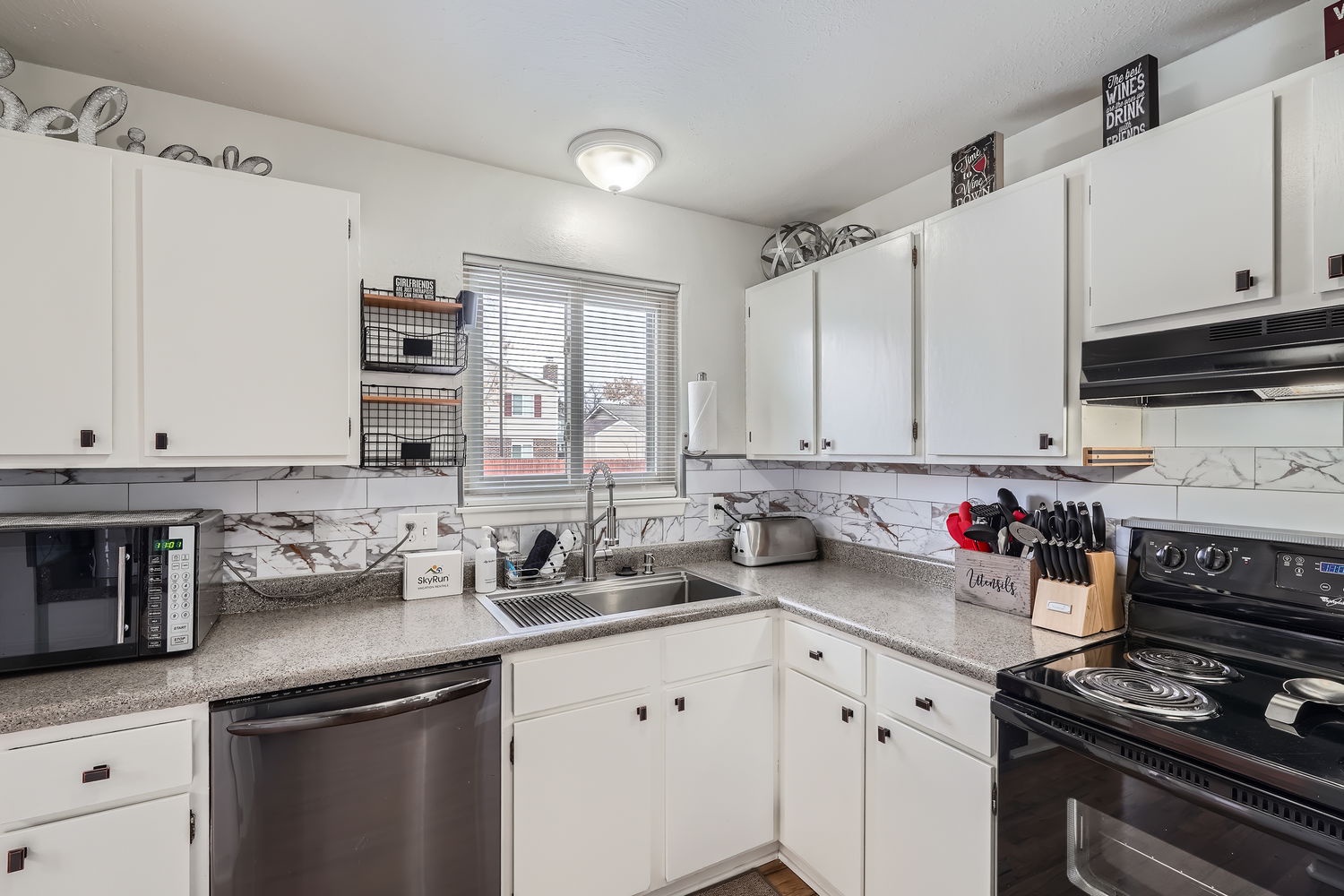 Step into your fully equipped kitchen, ready for home-cooked meals with generous counter space, modern appliances, and everything you need to feel right at home.