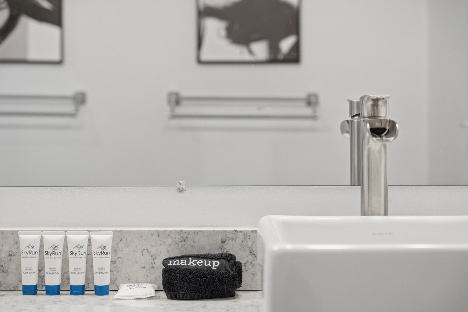 Refresh in your stylish bathroom featuring modern fixtures, fresh towels, and premium toiletries ready for your arrival—everything you need for a comfortable stay.