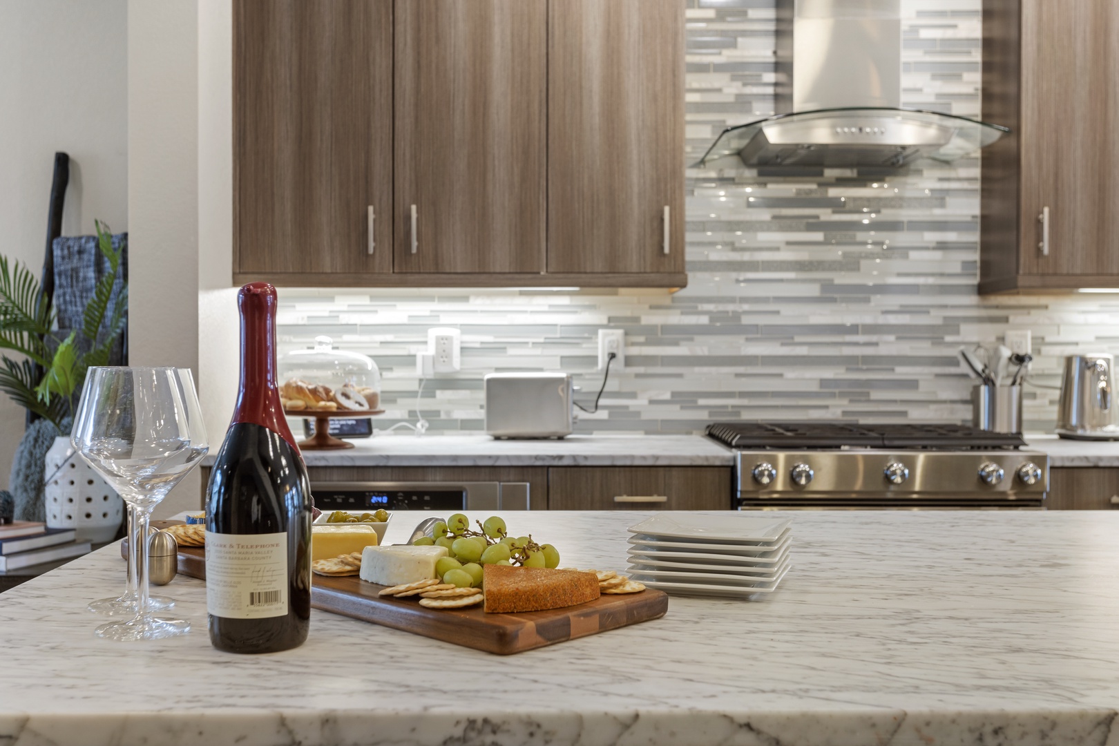 Your gourmet kitchen welcomes you with marble counters, premium appliances, and thoughtful touches for memorable meals together.