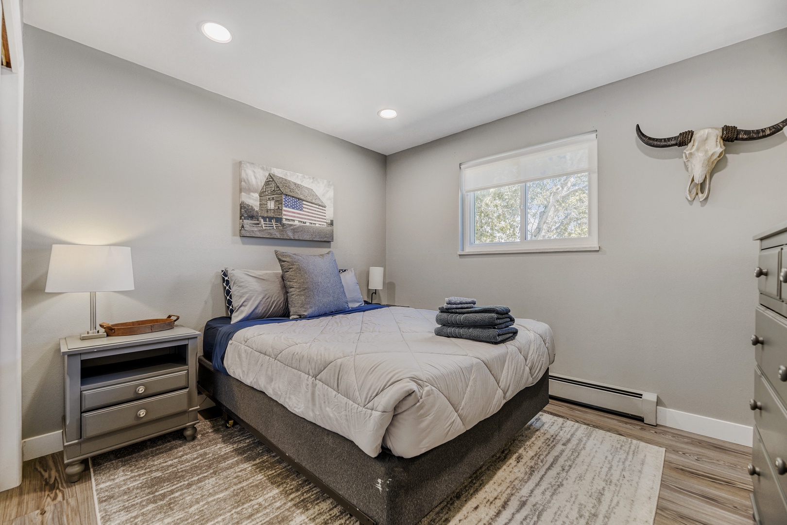 Step into your cozy retreat where soft linens and warm lighting create a peaceful haven for rest and relaxation after exploring the area.