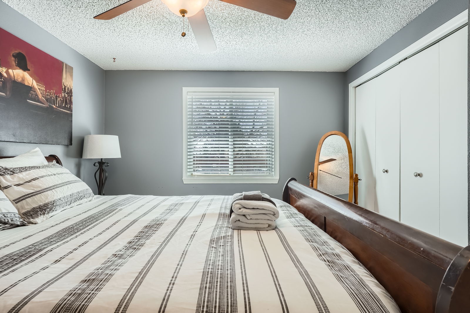 Unwind in your peaceful retreat with soft linens, gentle ceiling fan, and thoughtful touches that make this space truly yours.