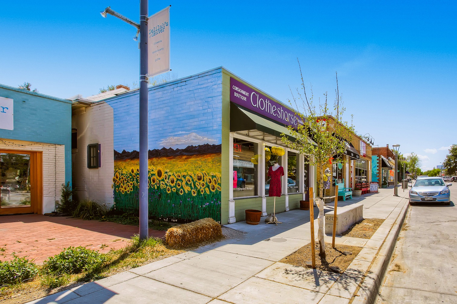 Colorful storefronts and local boutiques line the charming streets near the property, offering shopping, dining, and unique finds just a short walk away.