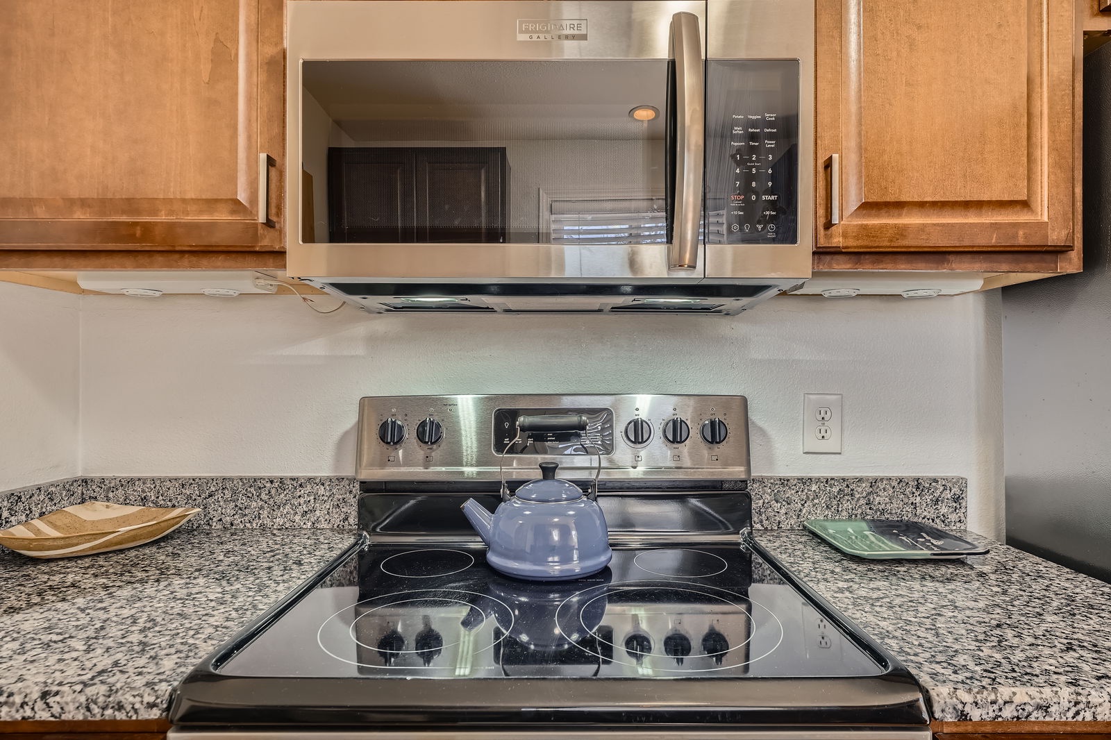 Your well-equipped kitchen features stainless steel appliances and granite countertops, perfect for preparing meals during your stay.