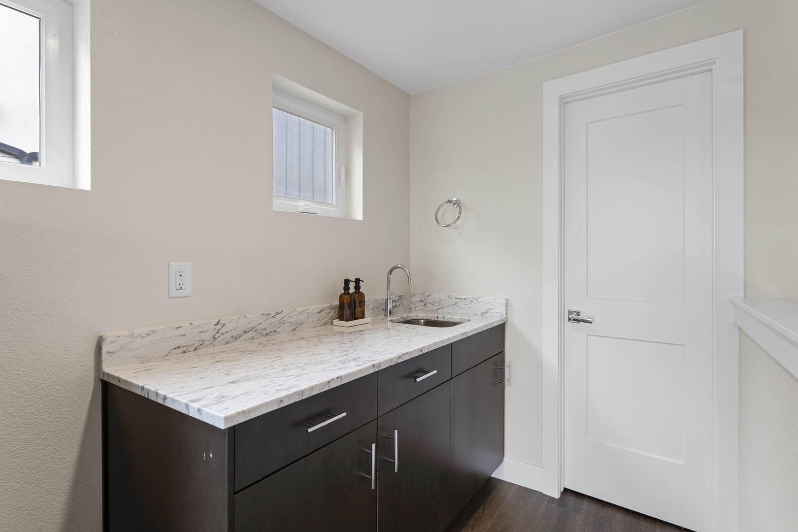 Freshen up in your elegant private bathroom with marble countertops and modern fixtures that make your daily routine feel luxurious.