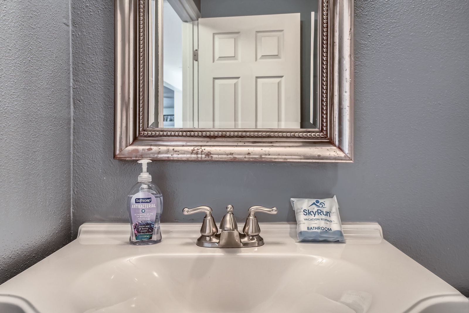 Start your morning at this elegant vanity with thoughtful touches like hand sanitizer and quality amenities.
