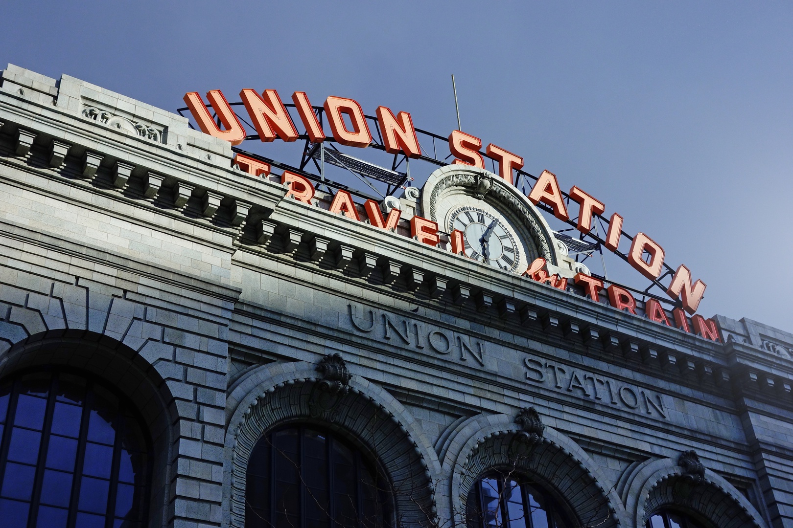 Historic Union Station stands as a landmark transportation hub with classic architecture and iconic signage in the surrounding area.
