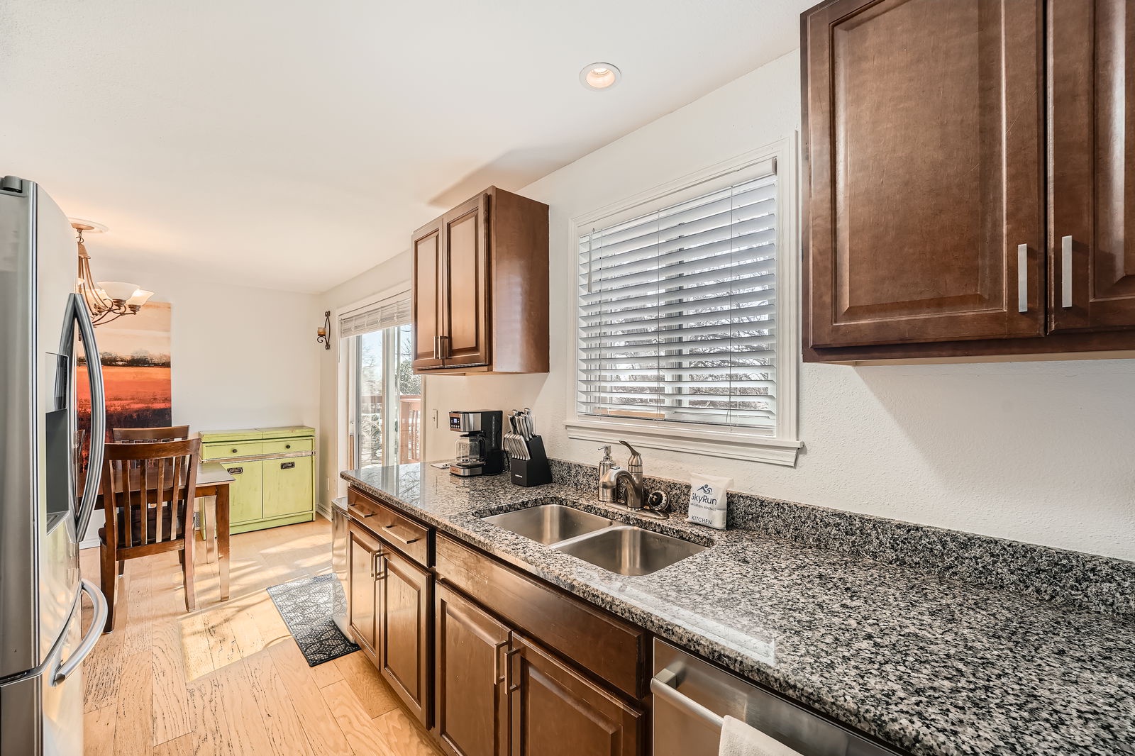 Your fully equipped kitchen awaits with granite counters, stainless appliances, and everything needed for memorable meals during your stay.