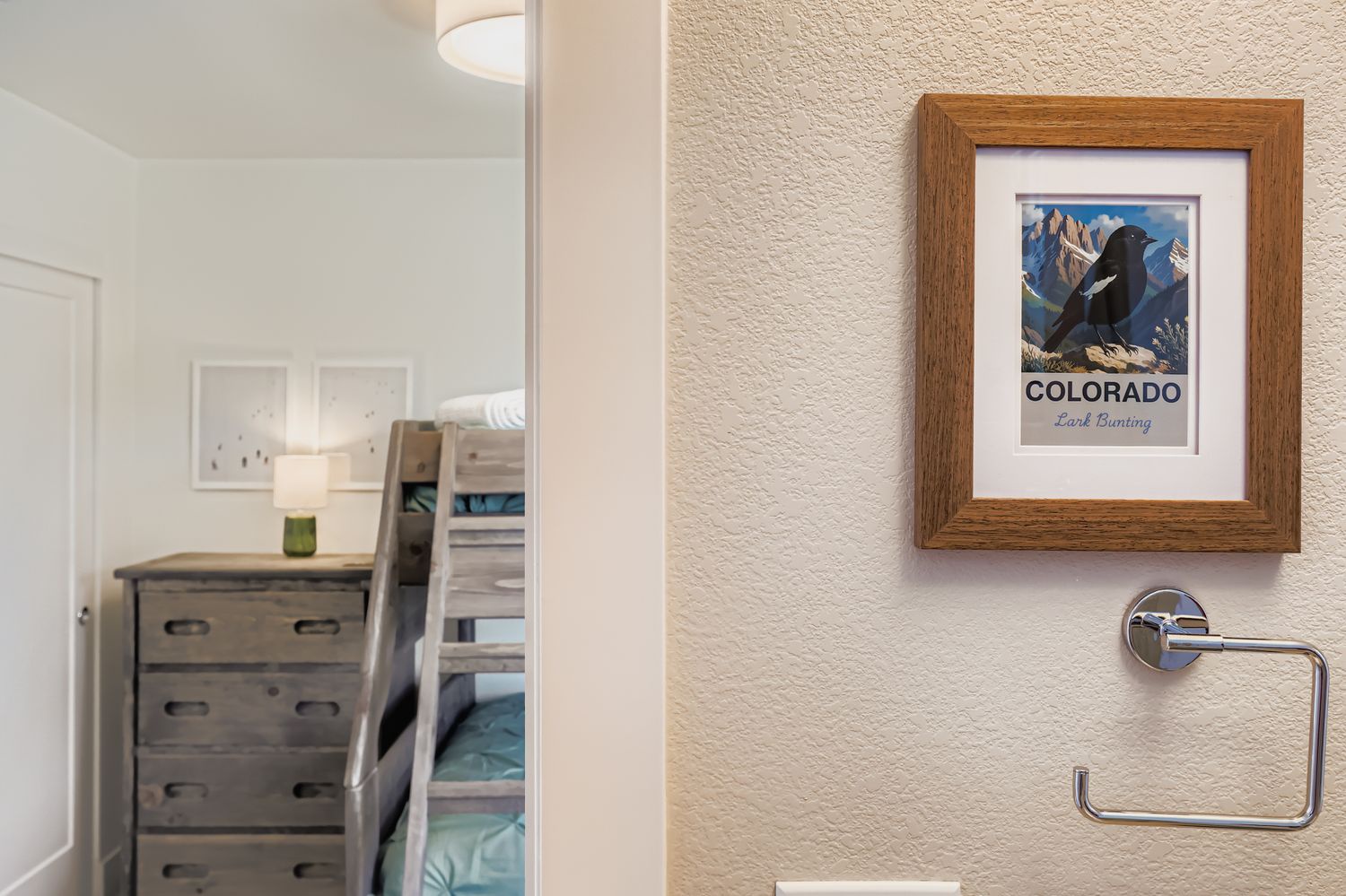 A peek into the cozy bedroom where your mountain adventure begins. Notice the thoughtful touches that make this space feel like home.