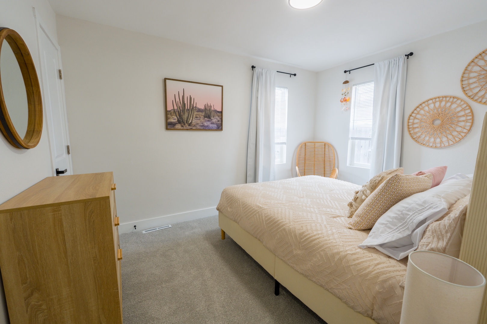 Drift off in this serene bedroom featuring natural textures, warm wood tones, and soft lighting that creates the perfect peaceful retreat.