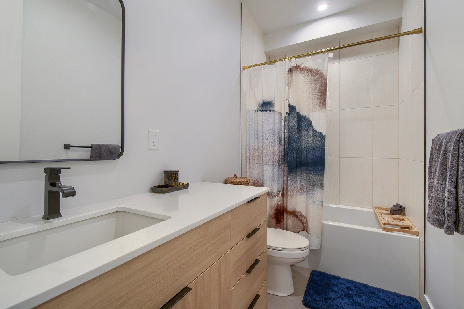 Step into your beautifully designed bathroom featuring a sleek soaking tub, modern vanity, and elegant finishes that create the perfect space for relaxation and self-care.