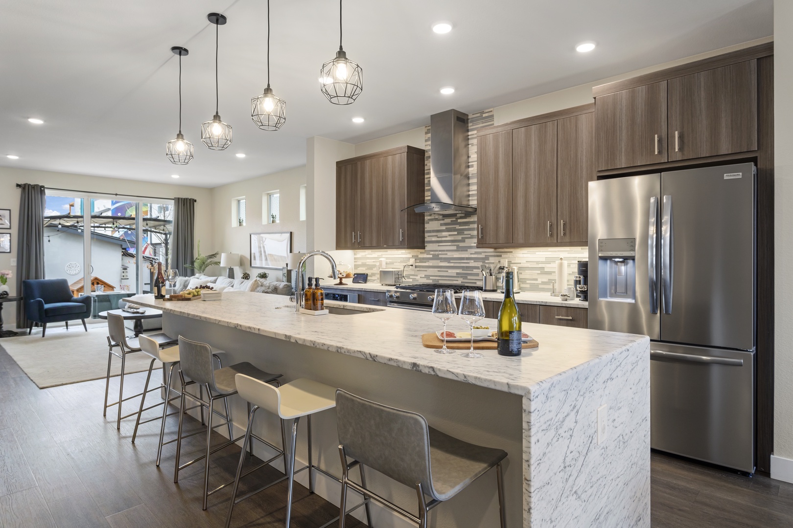 Step into your modern culinary haven with sleek pendant lighting, granite countertops, and everything you need to create memorable meals.