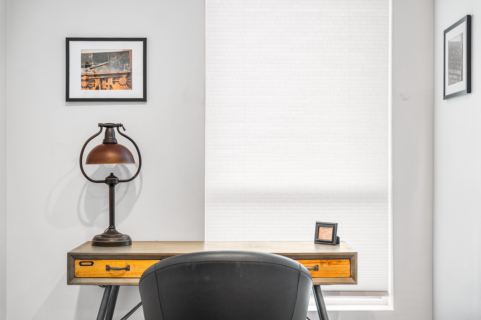 Settle into your private workspace featuring vintage-inspired furnishings, warm lighting, and thoughtful design—perfect for catching up on emails or planning your next adventure.